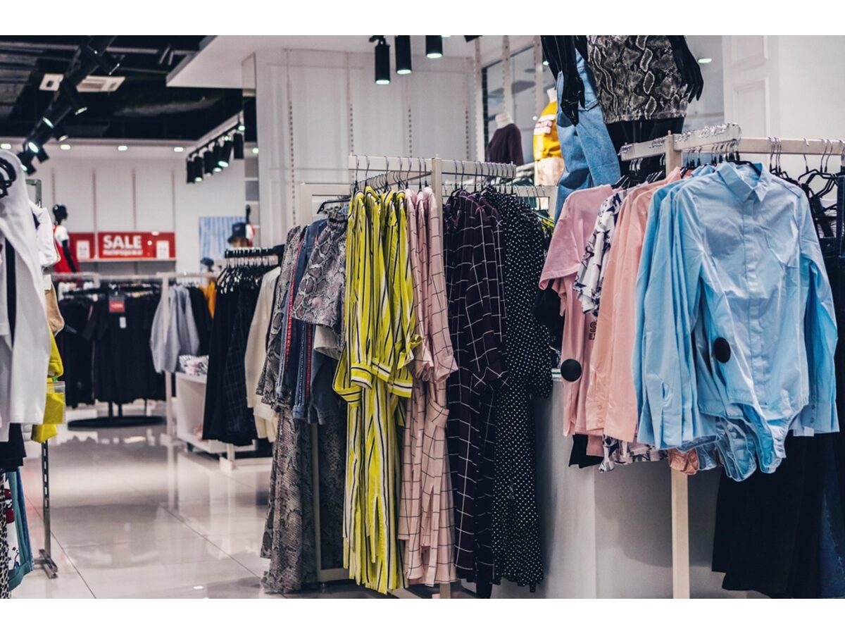 Products merchandised on rails inside a retail store